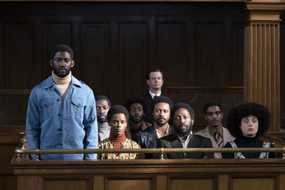 Malachi Kirby, Letitia Wright, Shaun Parkes, and Rochenda Sandall as defendants in the Mangrove trials in Steve McQueen’s Small Axe: Mangrove