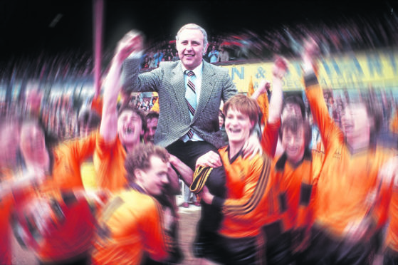 Legendary football manager Jim McLean, who died on Boxing Day aged 83, is carried high by his Dundee United players after they beat rivals Dundee 2-1 at Dens Park to clinch the league title on May 14, 1983