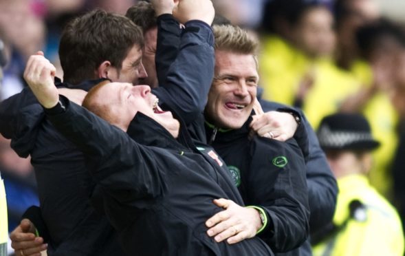 Johan Mjallby celebrates with Neil Lennon as Celtic won the title                     at Rugby Park in April 2012, six months after their jobs were on the line
