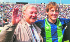 Sir Kenny with Tommy Docherty in 1986 at a game marking his 100 Scotland caps
