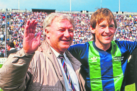 Sir Kenny with Tommy Docherty in 1986 at a game marking his 100 Scotland caps