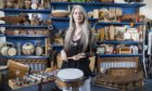 Evelyn Glennie surrounded by her vast collection of musical instruments