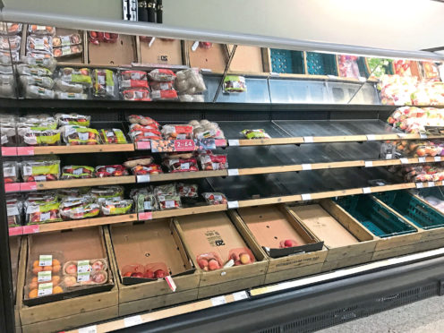 Empty shelves at a Marks & Spencer's store on the Lisburn Road in Belfast, with retailers 'experiencing some disruption after Brexit' and Marks and Spencer has temporarily withdrawn a small proportion of product lines to ensure its delivery lorries are not turned away at ports.