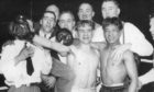 Benny Lynch, left, and rival Small Montana with their corner men after the bruising bout that made Lynch world champion without dispute