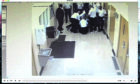 CCTV footage stills, of camera 331
, showing Allan Marshall being restrained by prison officers - he later died from his injuries.