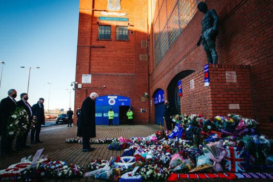 John Greig paying his respects outside Ibrox