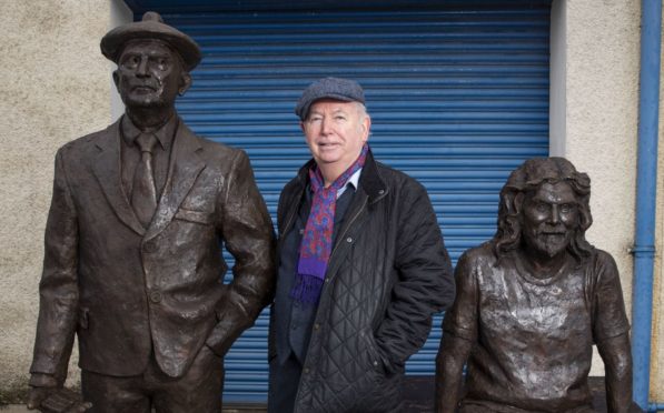 Colin Beattie with David Annand’s sculpture of comedy legends Chic Murray and Billy Connolly