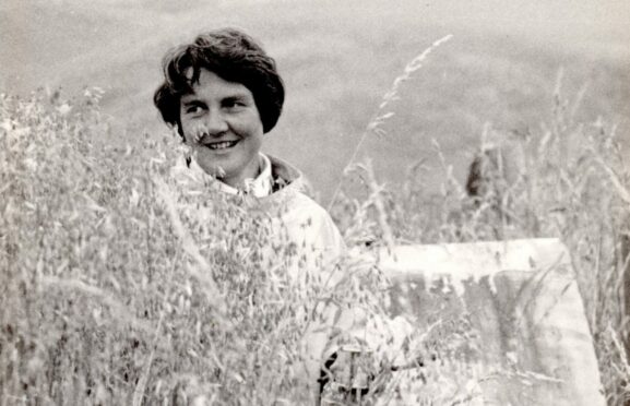 Artist Joan Eardley in a cornfield at Catterline behind her cottage