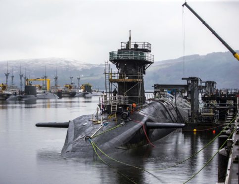 HMS Vigilant (front right), one of the UK's four nuclear warhead-carrying submarines.