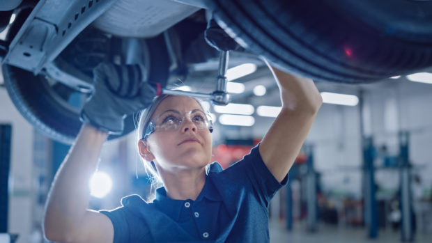 A mechanic repairs a car, as MOT and vehicle servicing are deemed essential work during the latest lockdown