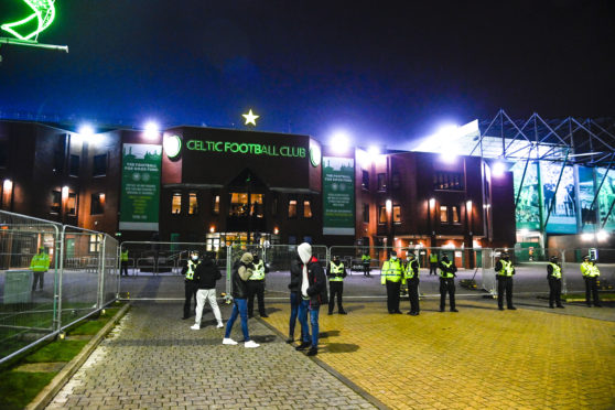 Police and barriers outside Celtic Park in December