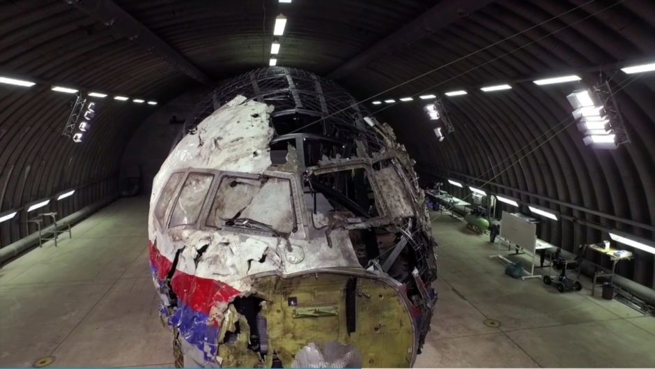The wreckage of Malaysia Airlines Flight MH17 being pieced together by authorities. A Bellingcat investigation found it had been shot down be a Russian-fired missile