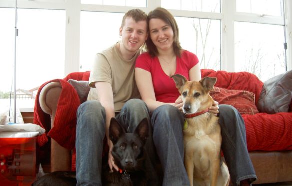 Luke and Jenny Ripley at home in Glenrothes with their dogs