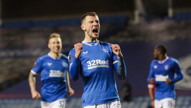 Borna Barisic celebrates after netting from the spot against Royal Antwerp