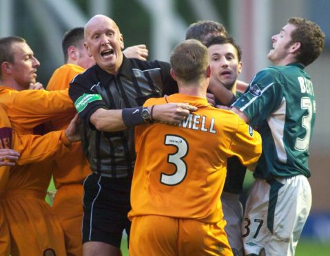 John Rowbotham in the thick of the action during a match between Motherwell and Celtic in May, 2004.