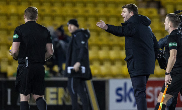 Steven Gerrard confronts referee John Beaton on the pitch at Livingston