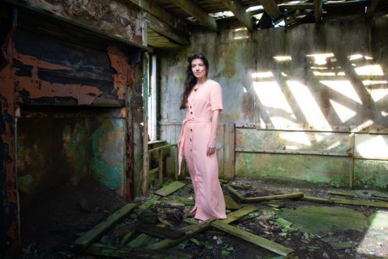 Cal Flyn in an abandoned house in Yesnaby, Orkney