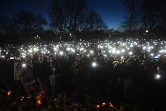 People use their phones to light up Clapham Common, London last night as part of an unofficial vigil for murder victim Sarah Everard