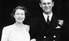 The then Princess Elizabeth and Lieutenant Philip Mountbatten posing for their first engagement pictures at Buckingham Palace.