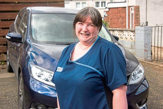 Amanda Hegarty with her Nissan car.