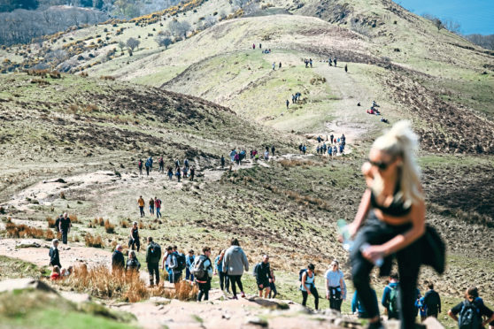 Crowds of people climbing up to the summit of Conic Hill on Loch Lomnd, as lockdown restrictions are eased and people are now allowed to leave their local areas.