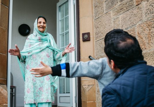 Anas Sarwar, with his son, Aliyan (4), visiting his grandmother, Rashida Begum (93), at her home in Glasgow. Rashida has been shielding due to her age, during lockdown, so was very happy to have them visiting.