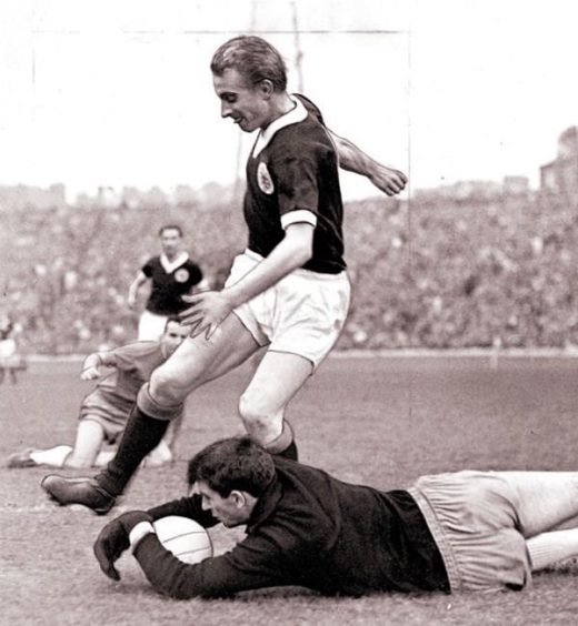 Denis Law playing for Scotland, 1965.