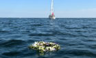 Gordonstoun pupils’ wreath in Moray Firth where Prince Philip learned to sail