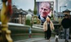 An image of the Duke of Edinburgh is displayed on an electronic billboard in Glasgow city centre yesterday