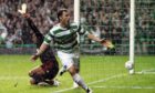 Scott McDonald turns away to celebrate after scoring a last-minute winner for Celtic against AC Milan in the Champions League in October, 2007