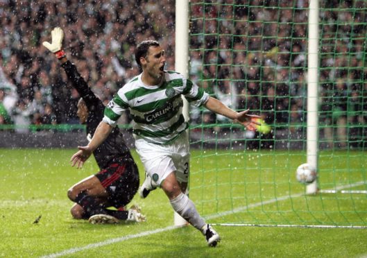 Scott McDonald turns away to celebrate after scoring a last-minute winner for Celtic against AC Milan in the Champions League in October, 2007
