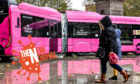New-look pink bus in Dunkirk, France where passengers go free