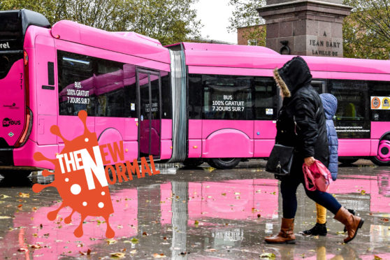 New-look pink bus in Dunkirk, France where passengers go free