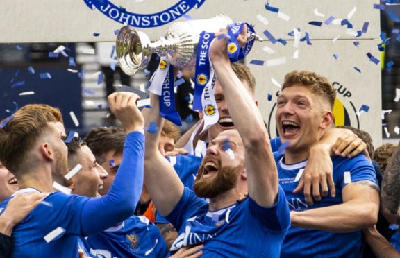 St Johnstone's Shaun Rooney lifts the Scottish Cup