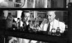 Canadian physiologist Charles Best, right, in the laboratory in 1960 with an assistant