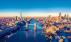 Aerial panoramic cityscape view of London and the River Thames, England.