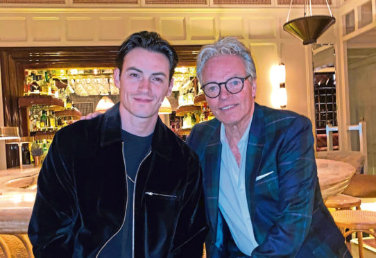 Songwriter David Stewart (left) with his dad, panto star Allan