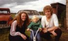 Young Callan Gordon with mum Jax and dad Iain in a treasured family photo