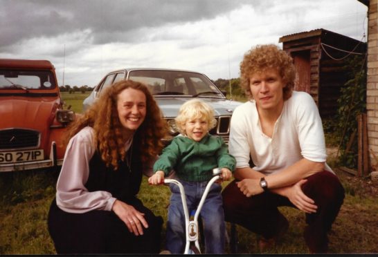 Young Callan Gordon with mum Jax and dad Iain in a treasured family photo