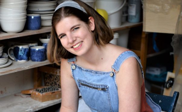 Author Elizabeth Macneal in her pottery workshop