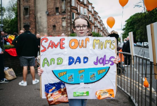 Tyra Hanratty, age 11, whose mum Sharon works at the factory, outside McVitie’s in Tollcross, Glasgow