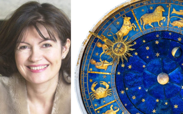 Celebrity astrologist Debbie Frank and the zodiac wheel