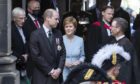 First Minister Nicola Sturgeon looks on as Prince William arrives to speak at the General Assembly of the Church of Scotland in Edinburgh yesterday
