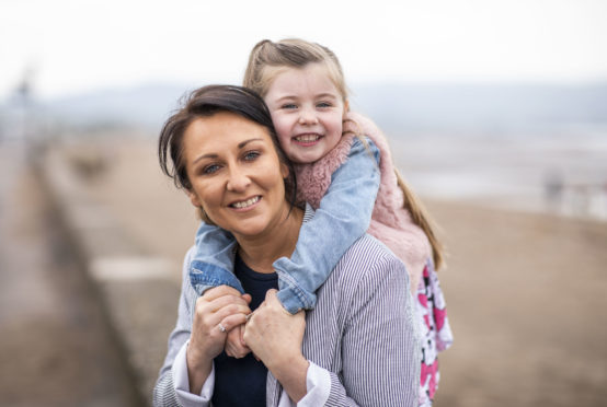 SNP MSP Siobhian Brown and her daughter Scarlett at Ayr beach