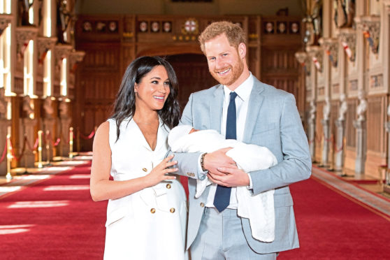 The then Duke and Duchess of Sussex with their baby son Archie Harrison Mountbatten-Windsor.