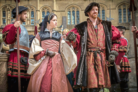 Anne Boleyn (CLAIRE FOY) and King Henry VIII (DAMIAN LEWIS) in BBC drama Wolf Hall.