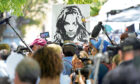 Portrait of Britney Spears looms over supporters and media members outside a court hearing concerning the pop singer's conservatorship at the Stanley Mosk Courthouse, in Los Angeles.