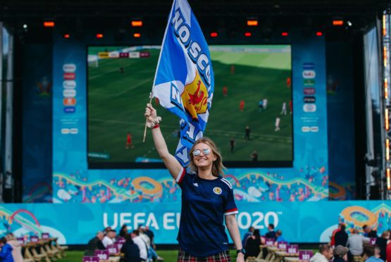 Scotland supporter Laura Luedke, 28, in the Fan Zone in Glasgow Green yesterday