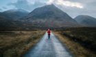 A lone hiker explores Glen Etive