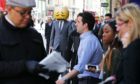 Sad-face emoji man tours London as TalkTalk launches low-price mobile SIM in 2015